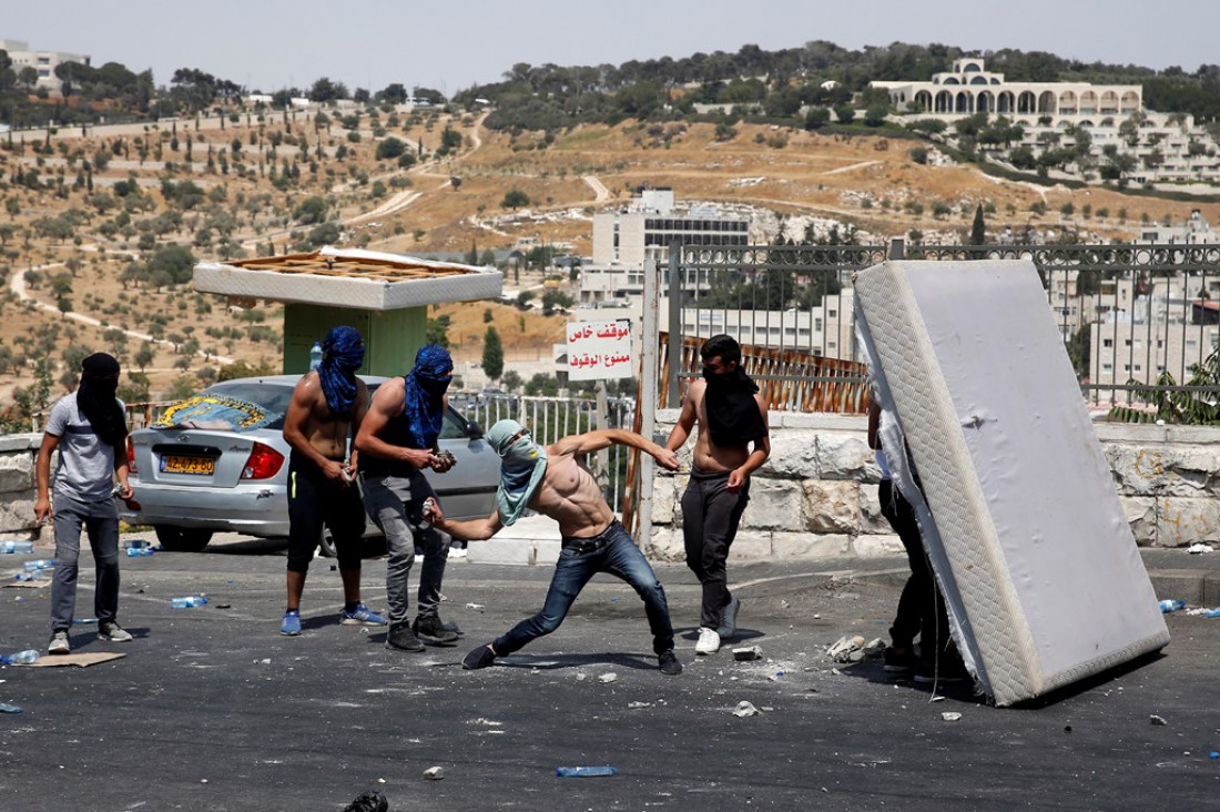 imagen Un palestino muerto y 200 heridos en disturbios en Jerusalén y Cisjordania
